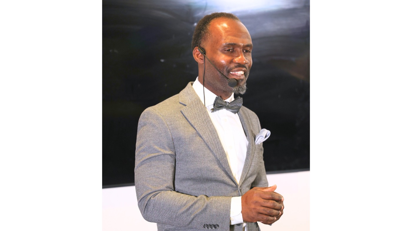 Wagner Desir speaking at an event
